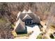 A high angle view of the beautiful house, long driveway, and well-maintained landscaping at 15 York Trce, Cartersville, GA 30121