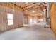 Spacious unfinished basement featuring exposed wooden beams and a blank canvas for customization at 15 York Trce, Cartersville, GA 30121