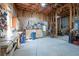Unfinished basement with tool storage, pegboard, and a workbench by the window at 15 York Trce, Cartersville, GA 30121