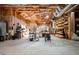 Unfinished basement with exposed wooden beams and ductwork offering versatile potential for customization at 15 York Trce, Cartersville, GA 30121
