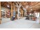 Unfinished basement space, perfect for workshop or storage with shelving, worktables, and storage at 15 York Trce, Cartersville, GA 30121