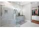 Elegant bathroom featuring a glass shower, a double sink vanity and a walk-in closet at 15 York Trce, Cartersville, GA 30121