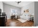 Charming bedroom features hardwood floors, natural light, desk, and stylish decor at 15 York Trce, Cartersville, GA 30121