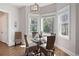 Cozy breakfast nook with bay window offers scenic views and warm lighting at 15 York Trce, Cartersville, GA 30121