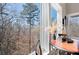 Close up of the dining area offering plenty of natural light and a view of the trees at 15 York Trce, Cartersville, GA 30121
