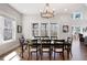 Formal dining room with a chandelier and natural light from the large windows at 15 York Trce, Cartersville, GA 30121