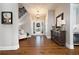 Foyer features hardwood floors, staircase and elegant lighting at 15 York Trce, Cartersville, GA 30121