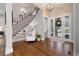 Hardwood foyer with staircase and French doors leading to the exterior at 15 York Trce, Cartersville, GA 30121