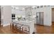 Gourmet kitchen featuring a large island, stainless steel appliances, and custom cabinetry at 15 York Trce, Cartersville, GA 30121