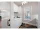 Well-equipped laundry room featuring modern washer and dryer and ample storage at 15 York Trce, Cartersville, GA 30121