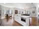 Open floor plan includes kitchen, living, and dining areas bathed in natural light at 15 York Trce, Cartersville, GA 30121