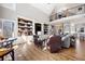 Open living room featuring custom built-ins, hardwood floors, and views of the upper loft at 15 York Trce, Cartersville, GA 30121