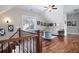 Open loft area with hardwood floors, comfortable seating, and ample natural light at 15 York Trce, Cartersville, GA 30121