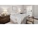 Cozy main bedroom featuring a sitting area and view to the ensuite bathroom at 15 York Trce, Cartersville, GA 30121