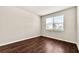 Bright and airy bedroom with hardwood floors and natural light at 1695 Beckworth Ln, Hampton, GA 30228