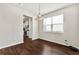 Dining area with hardwood floors, chandelier, and natural light at 1695 Beckworth Ln, Hampton, GA 30228