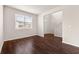 Cozy living room with hardwood floors and ample natural light at 1695 Beckworth Ln, Hampton, GA 30228