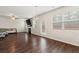 Bright living room with a backyard view from the sliding glass door at 1695 Beckworth Ln, Hampton, GA 30228