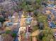 Expansive aerial view of the property showcasing its landscaping and neighborhood at 2533 Schooner Cv, Snellville, GA 30078