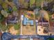 Beautiful aerial view of a home with a large yard and a detached garage at 2533 Schooner Cv, Snellville, GA 30078