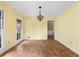 Bright dining room with wood floors and large windows at 2533 Schooner Cv, Snellville, GA 30078