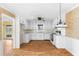 Well-lit kitchen with plentiful white cabinetry and modern appliances, perfect for cooking and entertaining at 2533 Schooner Cv, Snellville, GA 30078