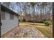 Back patio with stone pavers located next to the main house at 2533 Schooner Cv, Snellville, GA 30078