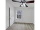 Bedroom with carpet and large window for great natural lighting at 324 Cheri Pl, Jonesboro, GA 30238