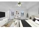 Bright main bedroom with a tray ceiling, and carpet floors at 324 Cheri Pl, Jonesboro, GA 30238