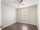 Bedroom featuring wood-look flooring and a window offering natural light at 4519 Legend Hollow Ln, Powder Springs, GA 30127