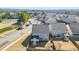 Aerial view showcasing the home's location within a community with mature trees and green spaces at 500 Anfield Dr, Woodstock, GA 30188