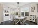 Dining nook with backyard view and a modern light fixture at 500 Anfield Dr, Woodstock, GA 30188