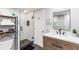 Modern bathroom featuring a sleek vanity, glass enclosed shower and stylish finishes at 7010 Hunters Knl, Atlanta, GA 30328