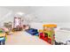 Spacious playroom with colorful decor, offering a fun and creative environment for children to play and explore at 7010 Hunters Knl, Atlanta, GA 30328