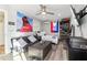 A modern bedroom with a comfortable bed, sleek furniture, and stylish decor at 5065 Sunrise Ln, Cumming, GA 30041