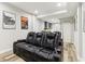 Cozy theater room with comfortable seating, perfect for movie nights at 5065 Sunrise Ln, Cumming, GA 30041