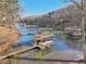 Amazing waterfront views of private boat dock and lift, ready for summer fun at 5065 Sunrise Ln, Cumming, GA 30041