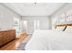 Inviting bedroom with hardwood floors, natural light, and a peaceful ambiance at 57 Moury Se Ave, Atlanta, GA 30315