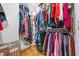 Spacious walk-in closet featuring custom organizers and ample storage and wood floors at 57 Moury Se Ave, Atlanta, GA 30315