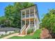 Charming two-story home with a front porch, nestled in a lush, green neighborhood at 57 Moury Se Ave, Atlanta, GA 30315