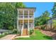 Inviting two-story home with dual front porches, landscaped yard, and craftsman details at 57 Moury Se Ave, Atlanta, GA 30315