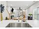 Bright, open-concept living room with fireplace, hardwood floors, and modern finishes at 57 Moury Se Ave, Atlanta, GA 30315