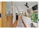 Inviting living room with hardwood floors, open layout, modern furnishings, and seamless flow to the kitchen at 57 Moury Se Ave, Atlanta, GA 30315