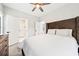 Spacious main bedroom with large bed, ceiling fan, and neutral color scheme at 57 Moury Se Ave, Atlanta, GA 30315