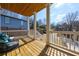 Relaxing porch with wood flooring, decorative railing, and comfortable seating at 57 Moury Se Ave, Atlanta, GA 30315