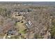 Drone's eye view of a residence nestled in the woods at 346 Mays Rd, Stockbridge, GA 30281