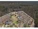 Aerial view shows the house and the property outlined by white line, surrounded by green fields and trees at 346 Mays Rd, Stockbridge, GA 30281