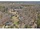 Sweeping aerial view of the sprawling property surrounded by lush trees at 346 Mays Rd, Stockbridge, GA 30281