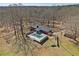 Aerial view showcasing the home with pool, deck and surrounding landscape at 346 Mays Rd, Stockbridge, GA 30281