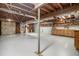 Unfinished basement with concrete flooring and exposed ceiling offering lots of open storage space at 346 Mays Rd, Stockbridge, GA 30281